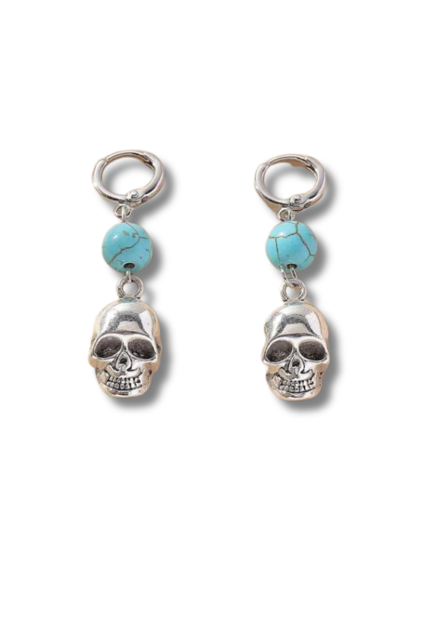 Skull with Turquoise Gemstone